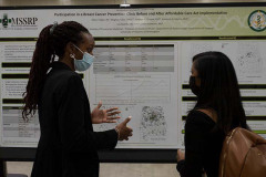 San Antonio, TX - SABCS 2021 San Antonio Breast Cancer Symposium - Attendees look over posters during the Poster Session here today, Wednesday December 8, 2021. during the San Antonio Breast Cancer Symposium being held at the Henry B. Gonzalez Convention Center in San Antonio, TX. The symposium features physicians, researchers, patient advocates and healthcare professionals from over 90 countries with the latest research on breast cancer treatment and prevention. Photo by © MedMeetingImages/Todd Buchanan 2021 Technical Questions: todd@medmeetingimages.com