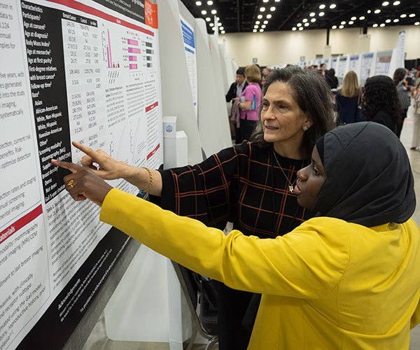 San Antonio, TX - SABCS 2025 San Antonio Breast Cancer Symposium @ SABCS Presenters and attendees during Poster Session here today, Thursday December 11, 2025. during the San Antonio Breast Cancer Symposium being held at the Henry B. Gonzalez Convention Center in San Antonio, TX. The symposium features physicians, researchers, patient advocates and healthcare professionals from over 90 countries with the latest research on breast cancer treatment and prevention. Photo by © MedMeetingImages/Todd Buchanan 2025 Technical Questions: todd@medmeetingimages.com