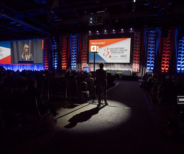 San Antonio, TX - SABCS 2025 San Antonio Breast Cancer Symposium @ SABCS Joanne Kotsopoulos, MD speaks during General Session 3 here today, Friday December 12, 2025. during the San Antonio Breast Cancer Symposium being held at the Henry B. Gonzalez Convention Center in San Antonio, TX. The symposium features physicians, researchers, patient advocates and healthcare professionals from over 90 countries with the latest research on breast cancer treatment and prevention. Photo by © MedMeetingImages/Todd Buchanan 2025 Technical Questions: todd@medmeetingimages.com